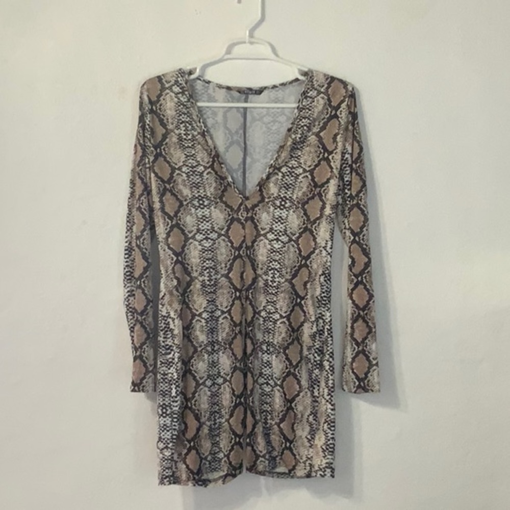Snake print romper with deep v line